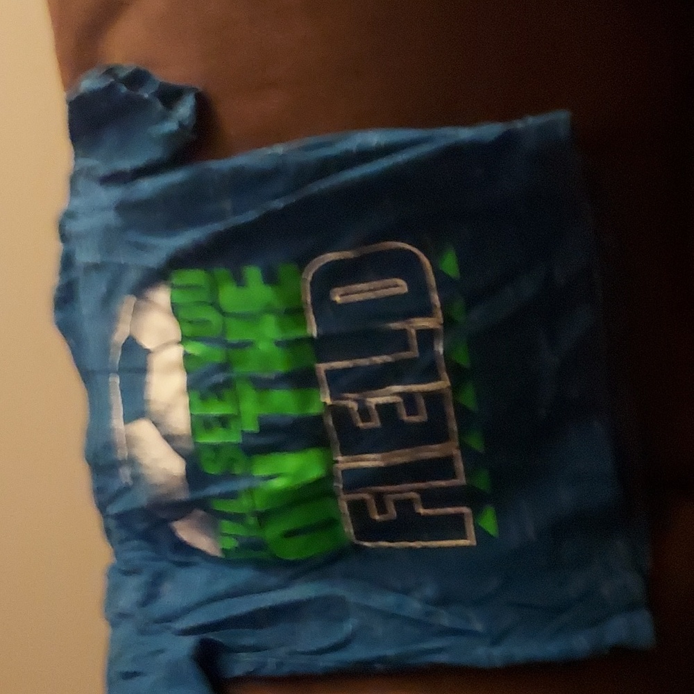 Oshkosh soccer shirt